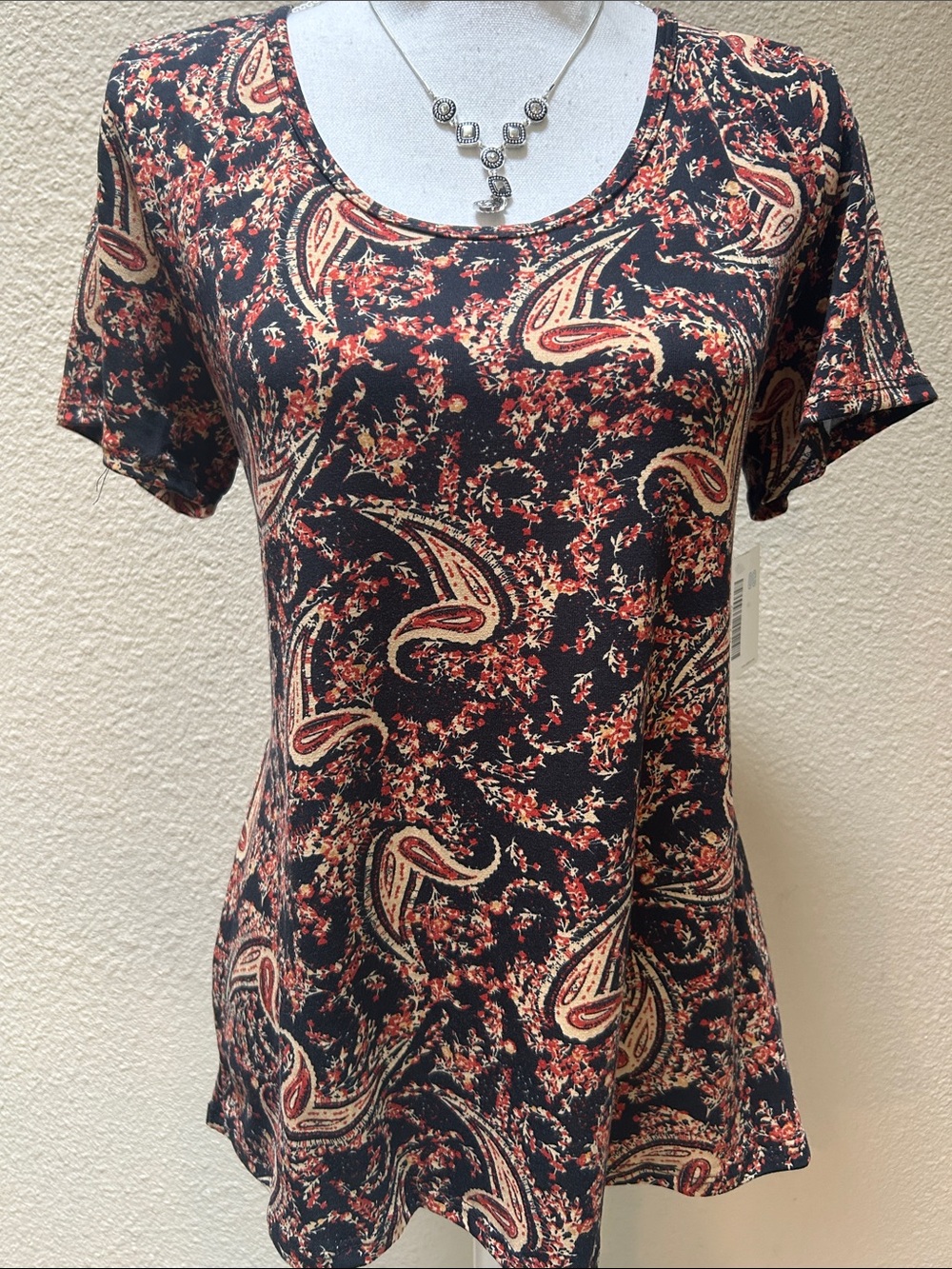 LuLaRoe Black Paisley Short Sleeve Tee with Red and Cream Accents
